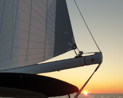 Sunset shortly after departure—but it was a bright night, ideal for sailing